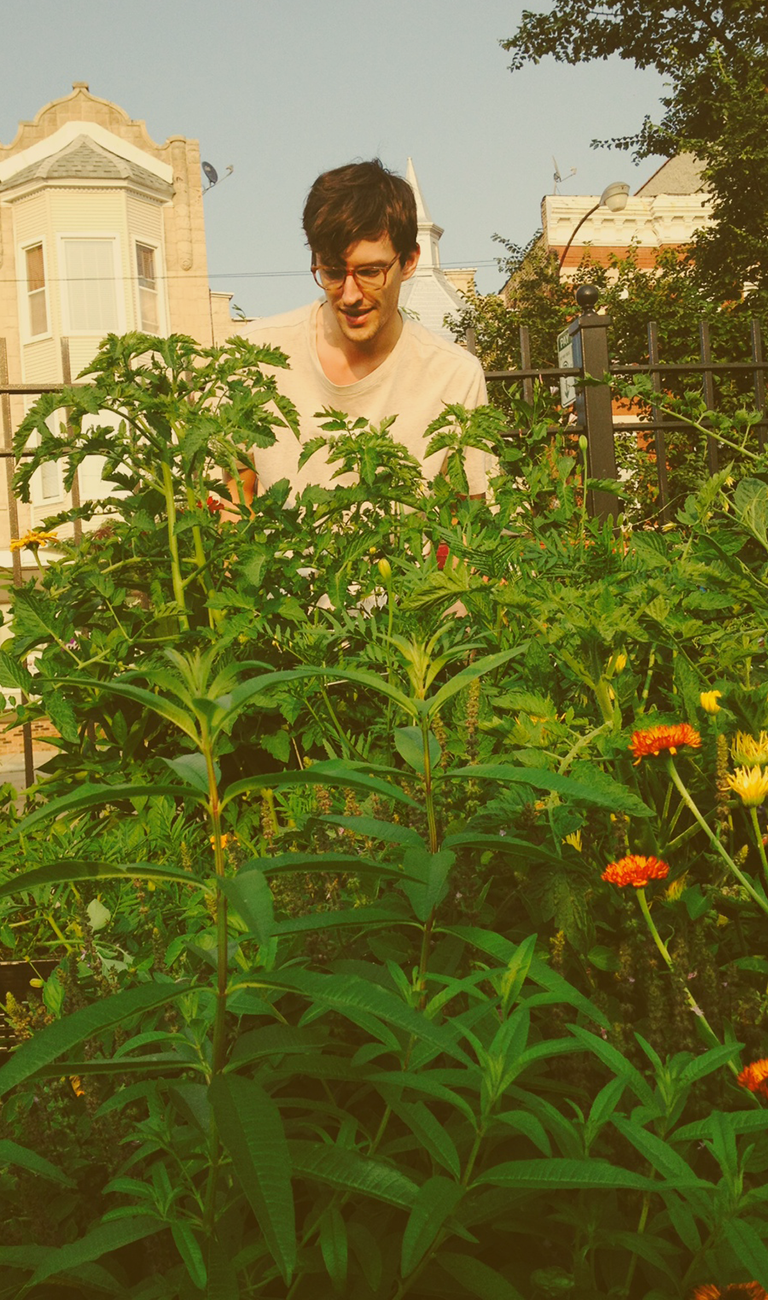 Picture of author in their garden.